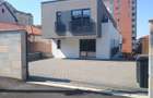 Cladire moderna, superfinisata 500 mp, compus din 4 apartamente, teren - 7