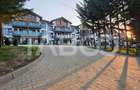 Apartamente cu curte - perfect: camin in inima naturii sau investitie