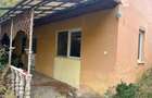 Casă cu Teren 2000 Mp în Răhău