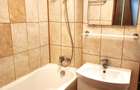 Inchiriez garsoniera decomandata , zona Titulescu , bloc anvelopat , etaj 10 din 11 , cu vedere superba catre Casa Poporului , utilata complet - 4