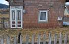 Casa lemn masiv acoperita recent + 5 anexe + teren peste 15000 mp la 46000 Euro negociabil - 2