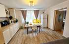 Casa 4 camere, 2 bai, 2 bucatarii, 1050 mp teren, zona Centru