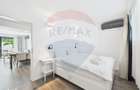 Apartament la parter ce are curte proprie , 2 camere in Bloc nou - 9