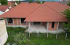 Casa de vanzare 260 mp utili + 1052 mp teren in centrul orasului Covas - 4