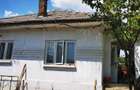 Husi, casa de vanzare cu 4 camere si teren 2000 metri