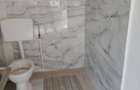 Inchiriez casa cu teren (5 camere + baie + bucatarie)