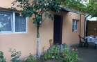 Schimb casa de caramida cu apartament 2 camere si o diferenta
