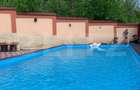 Casa P+1+M cu piscina si 1057 mp de teren, pozitionata inedit - 4