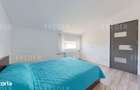 Apartament mobilat ?i utilat complet, cu curte proprie