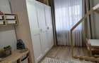 Vand apartament patru camere,Mioveni , renovat de la placa,liber - 7