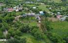 Gospodarie cu anexe si piscina cu 2 Ha teren + 20 Ha teren extravilan - 8