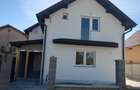 Vand casa semifinisata cu curte si teren intravilan