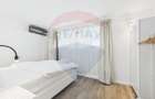 Apartament la parter ce are curte proprie , 2 camere in Bloc nou - 10