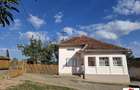 Casa cu teren si gospodarie in Cuta- Socond 27000 Euro