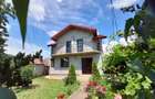Vand casa 5 camere langa Primarie cu teren de 1000m