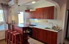 Inchiriez apartament CETATE - 3 camere plus living cu bucatarie - 1