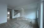 Duplex cu 4 camere, 3 bai,teren 250 mp in zona Dambovita