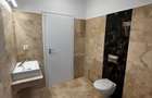 Apartament NOU 3 camere - curte de 155 mp zona Crevedia Kaufland - 1