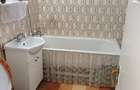 Persoana fizica vinde apartament cu 2 camere decomandate in Nicolina 2 la parter