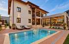 Proprietate exclusivista cu piscina, garaj si teren de 900 mp