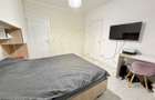 Apartament cu 3 camere, dressing si debara mobilat la etaj intermediar - 11