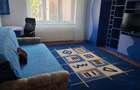Inchiriez un apartament central. cu 2 , camere , living, curte - 6