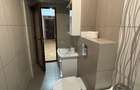 apartament cu 2 camere(transformat in 3 camere), situat pe strada Gheorghe Petra?cu, in bloc P4 - 5