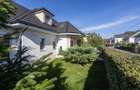 Casă deosebită în Balotești, stil bavarez, 260 mp utili, teren 556 mp și garaj