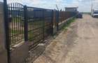 Vand teren intravilan intre case - 1
