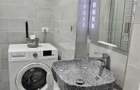 Apartament de vanzare cu terasa ?i beci, gata de utilizare