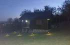 Casa din lemn + 29 de arii teren intravilan