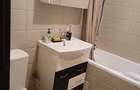 Apartament cu 3 camere semidecomandat în Rahova