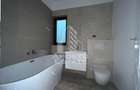 Duplex cu 4 camere, 3 bai,teren 250 mp in zona Dambovita