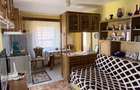 CASA CU TEREN 1.668 MP | BUJORENI - 2