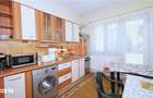 Apartament cu terasa, curte si parcare, intr-o zona linistita de case