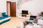 Apartament la parter cu gradina