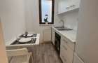 Inchiriez garsoniera in bloc boutique, cu curte!