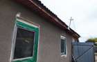 De vânzare!  Proprietate cu doua imobile ,situate pe un teren generos de 1500 MP - 12