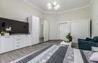 Apartament ultracentral cu 4 camere decomandat, etaj intermediar - 5