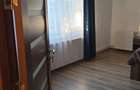 inchiriez apartament cu o camera cu curte comuna