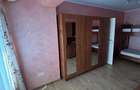 apartament cu 2 camere(transformat in 3 camere), situat pe strada Gheorghe Petra?cu, in bloc P4 - 7