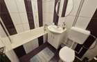 Garsoniera renovata in zona linistita Racadau - 11