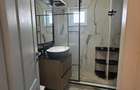 Dau spre inchiriere un apartament cu 2 dormitoare si living bucatarie open space - Calea Buziasului - 14