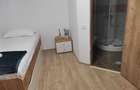 Inchiriez camere in cladire - 8