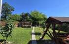 Casa in Livezeni , 140 mp utili , in centrul localitatii . - 13