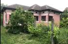 Casa ?i anexa din caramida 1500 mp