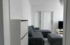 Apartament 2 camere de vânzare - Piața Romană - mobilat nou, vedere pe spate