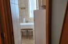 Inchiriez garsoniera decomandata , zona Titulescu , bloc anvelopat , etaj 10 din 11 , cu vedere superba catre Casa Poporului , utilata complet - 3
