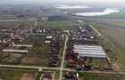 Teren 1.570 mp + casă din cărămidă–zonă liniștită