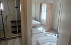 Dau spre inchiriere un apartament cu 2 dormitoare si living bucatarie open space - Calea Buziasului - 9